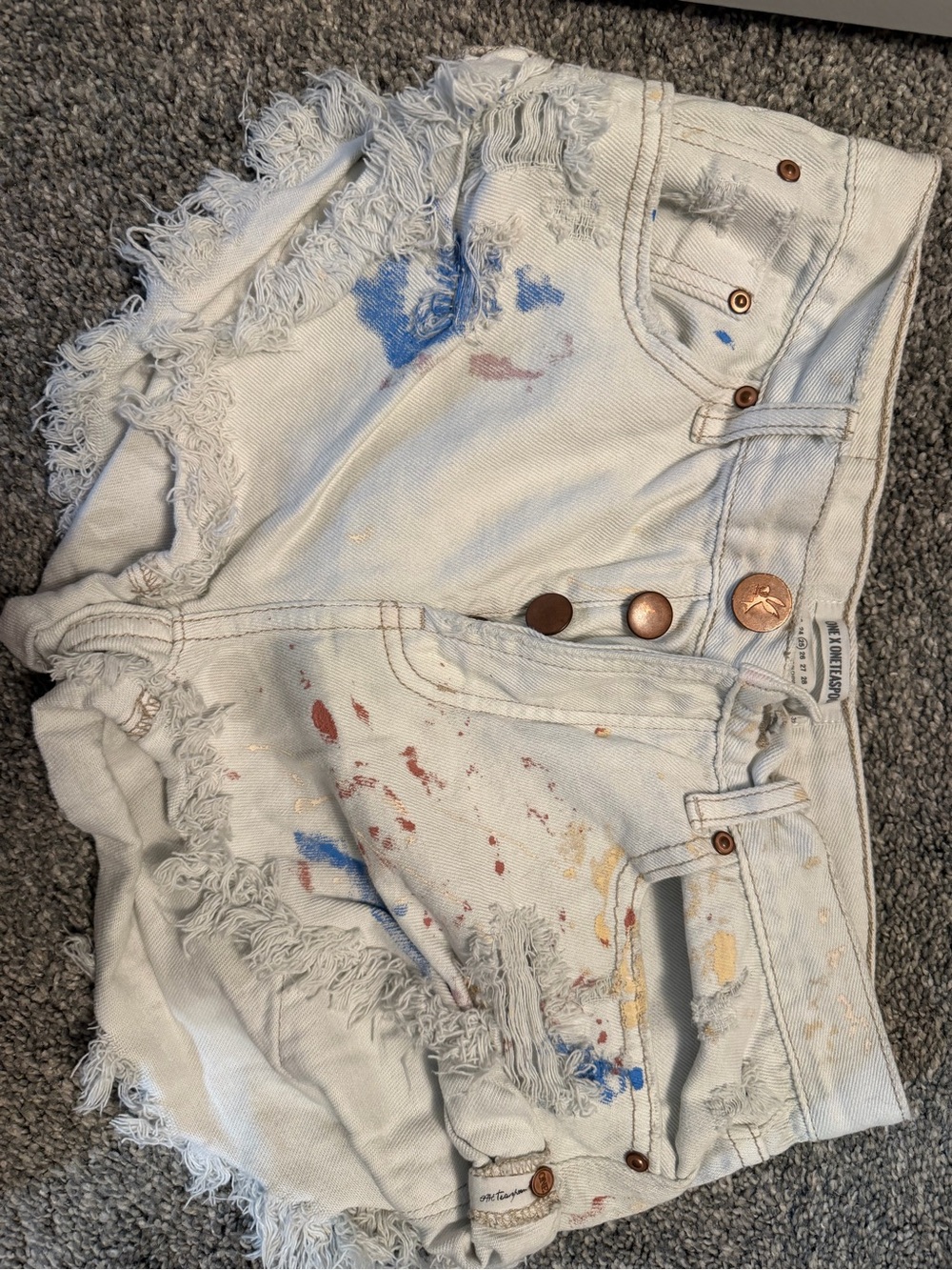 One x Oneteaspoon Distressed Paint-Splatter White Denim Shorts